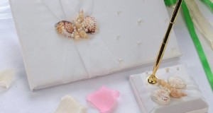 Remedios Boutique 2-Piece Bridal Accessory Set of Ivory Satin Floral Guest Book and Pen with Pen Holder